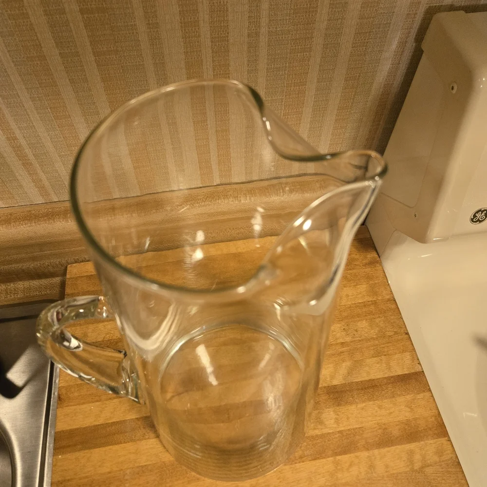 Hand blown glass pitcher